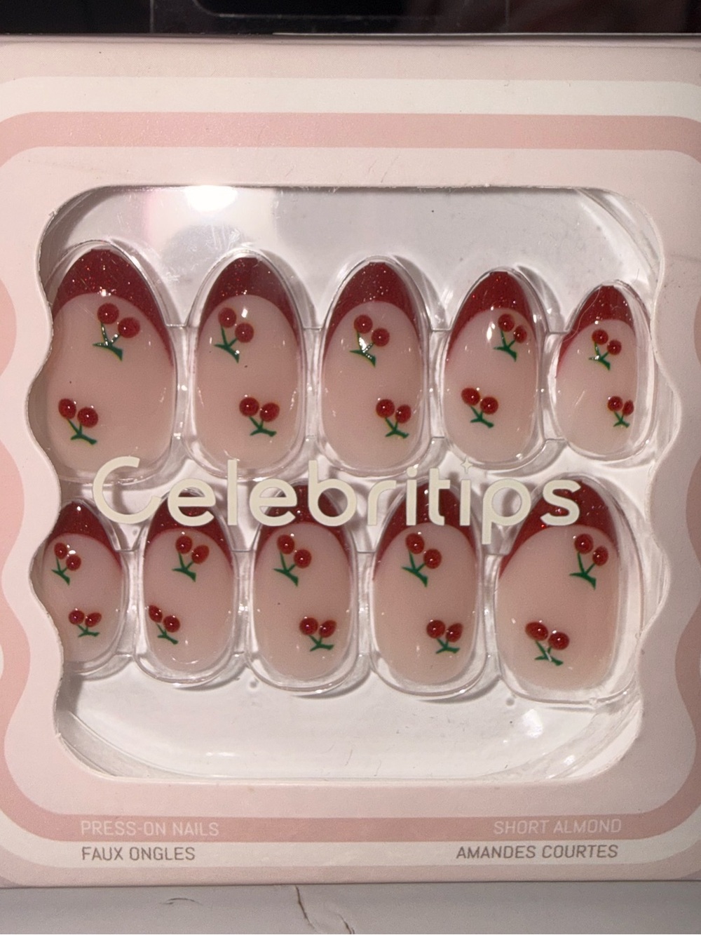 Short Almond Press-On Nails in Nude with Red Cherry Accent